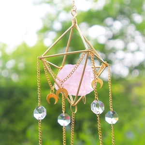 Golden geometric suncatcher with natural rose quartz and crystal moon pendants decor