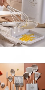 Detail of 12-piece silicone kitchen utensil set with wooden handles and storage bucket