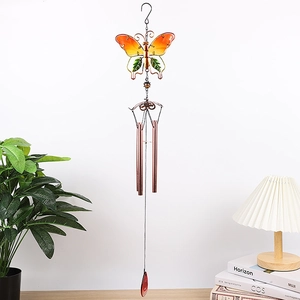 Detail of metal butterfly wind chime with colorful glass wings and four aluminum tubes