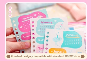 Close-up of Macaron color monthly planner pages for M5 and M7 six-hole binders