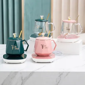 Nordic ceramic mug set with diamond facet design, heated base, and green gift bag