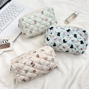 Three quilted cotton pencil cases with cute animal prints and secure metal zipper detail