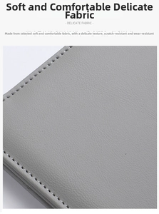 Macro detail of grey PU leather texture and precise stitching on the passport cover