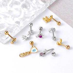 Mix of stainless steel cartilage studs with zircon heart and butterfly pendants