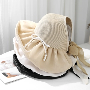 Women foldable sun visor hats with pearl bows and wide brims in beige, white and black
