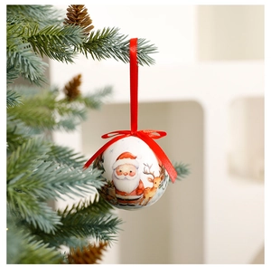 Close-up of 8cm Christmas ball ornament with Santa and deer patterns on a festive tree