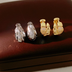 Detailed comparison of 14K gold plated zircon ear cuff and silver faceted hoop earrings