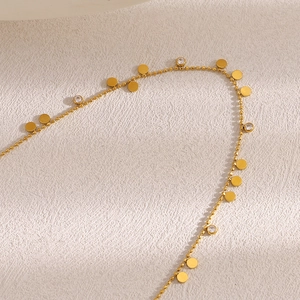 Collier chaîne à billes en acier inoxydable doré 18K avec disques et zircons
