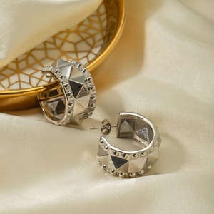 Polished stainless steel C-shaped stud earrings with punk rivets and black triangle detail