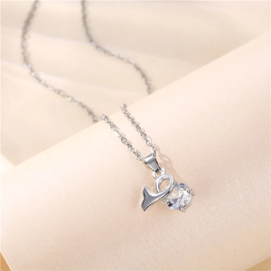 Titanium steel necklace with silver horn pendant and sparkling round cubic zirconia