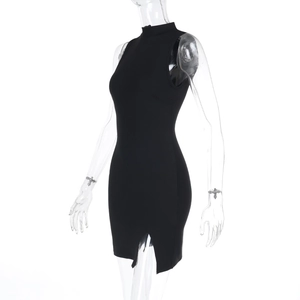 Detail view of black slim fit sleeveless mini dress with split hem and stand collar