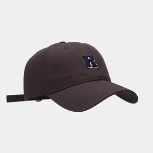 Side view of dark brown cotton baseball cap with blue and white R embroidery detail