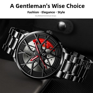 Detailed close-up of a racing watch with 3D wheel rim design and red brake caliper