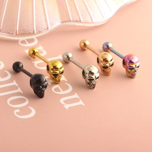 Skull tongue rings set in black, gold, silver, rose gold and rainbow surgical steel