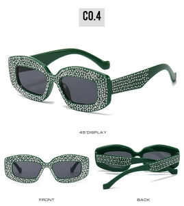 Detailed views of dark green rectangular sunglasses with sparkling silver rhinestones