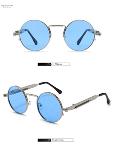 Close-up of silver steampunk sunglasses with spring hinges and round blue lenses
