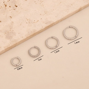 Detailed view of silver titanium steel hoop earrings in four sizes from 0.8cm to 1.4cm
