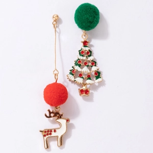 Detailed shot of asymmetrical Christmas earrings with plush red and green pom poms