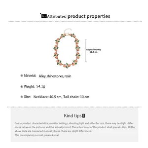 Detailed size specifications for flower necklace with orange resin and green rhinestones