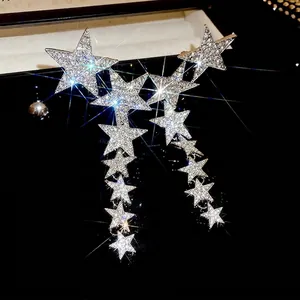 Elegant silver star tassel earrings with sparkling crystals and long drop design