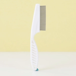 White pet grooming brush with fine metal bristles and ergonomic handle for cats and dogs