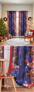 Macro detail of Christmas themed curtains showing Santa, elk prints and soft fabric texture