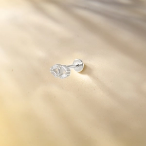 Macro detail of 925 sterling silver tassel earring with sparkling drop zircon stones