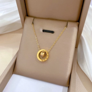 Titanium steel necklace with Roman numeral ring and crystal cylinder in jewelry box