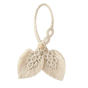 Detail of leaf-shaped woven cotton curtain tieback with a natural wood bead