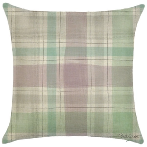 Detail of blue linen throw pillow cover featuring nautical grid pattern and designer signature