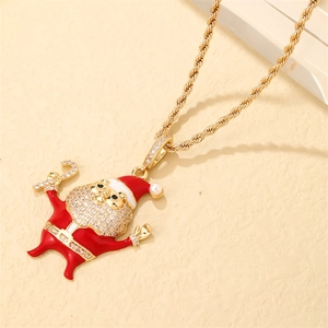Detail of Santa Claus pendant with gold chain, red enamel, and sparkling zircon stones