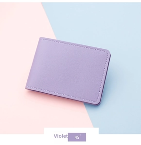 Detailed 45-degree angle view of violet lychee pattern leather card holder with fine stitching