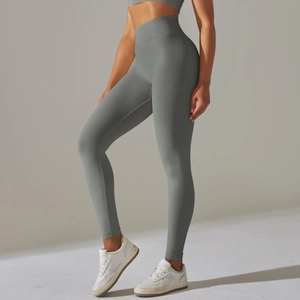 Close-up of gray seamless high-waist yoga leggings with tummy control and butt lift detail