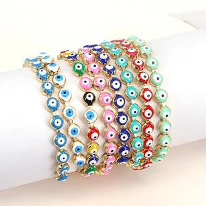 Bohemian evil eye beaded bracelets in various colors with golden plating details
