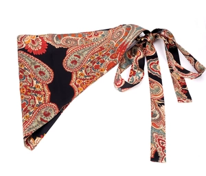 Detail view of Bohemian paisley pattern on silk-like triangular scarf belt for dresses
