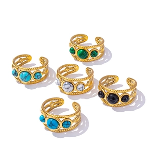 Set of five adjustable stainless steel gold rings with vintage textures and colorful stones