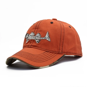 Orange cotton baseball cap with white fishbone embroidery and camouflage brim detail