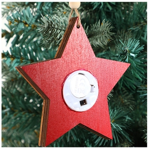 Macro detail of the back battery compartment and ON/OFF switch on a wooden Christmas star light