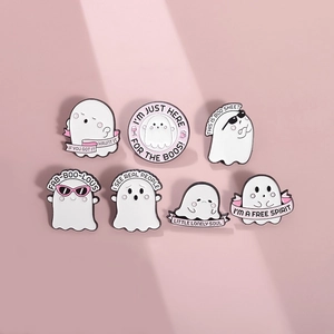 Set of 7 cute cartoon white ghost enamel pins with funny Halloween puns and pink accents