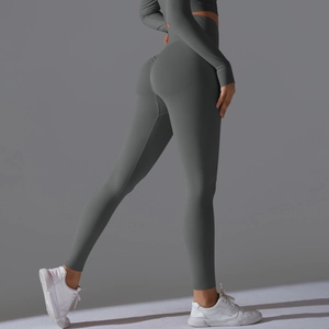 Detail view of seamless dark gray high waist yoga pants with scrunched butt design