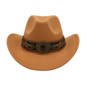 Close-up of western felt hat with ethnic embroidery and bronze buckle with red gem