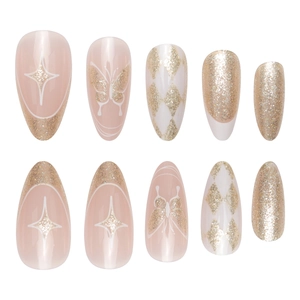 Faux ongles amande dorés scintillants avec motifs papillon blanc et étoiles