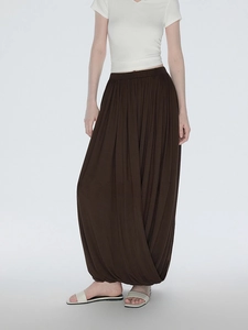 Deep chocolate brown high waist draped culottes skirt with a flowing irregular silhouette