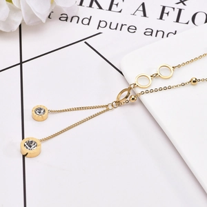 Gold titanium steel long necklace featuring Roman numerals circle and crystal tassel pendant