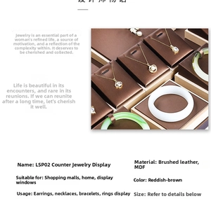 Detailed reddish brown brushed leather jewelry display set for necklaces and rings