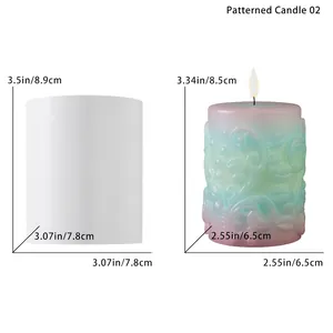 Detail of cylindrical candles showing minimalist white and floral embossed gradient designs