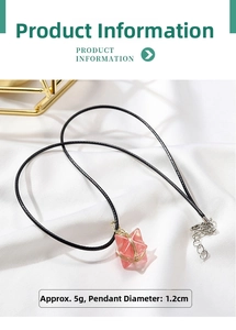 Detail of pink crystal Merkaba star pendant with gold wire wrap on black cord