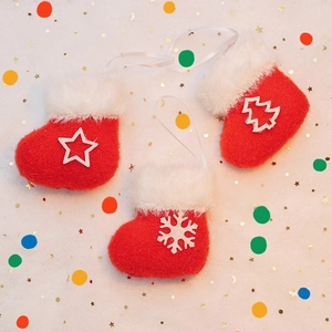 Set of 3 plush red Christmas stocking ornaments with snowflake and star patterns
