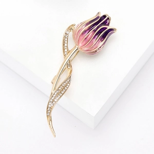 Detailed view of enamel tulip brooch with purple gradient petals and sparkling rhinestones