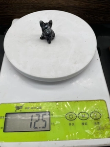 3cm hand-carved natural stone French Bulldog figurine on scale weighing 12.5 grams